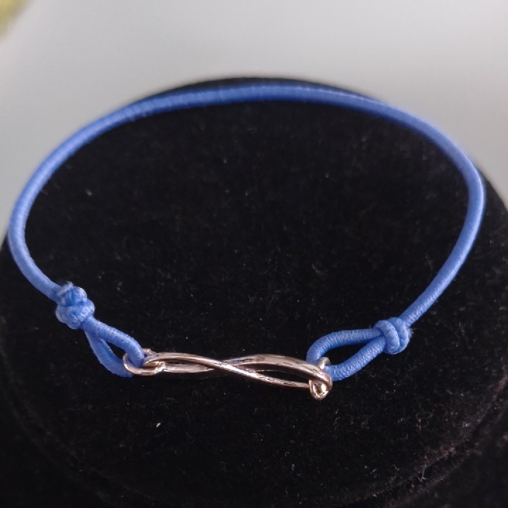 Avon Blue and Silver Infinity Bracelet